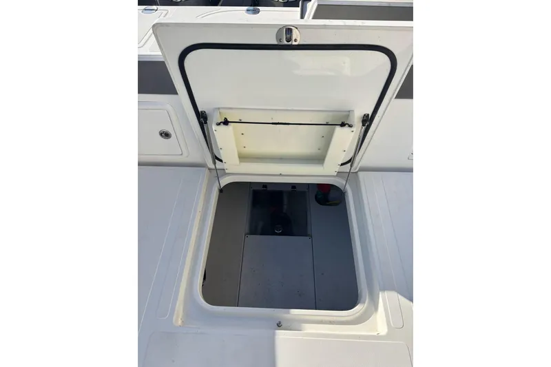  Yacht Photos Pics Open hatch on 2017 Venture 39 Open boat deck, revealing storage compartment.