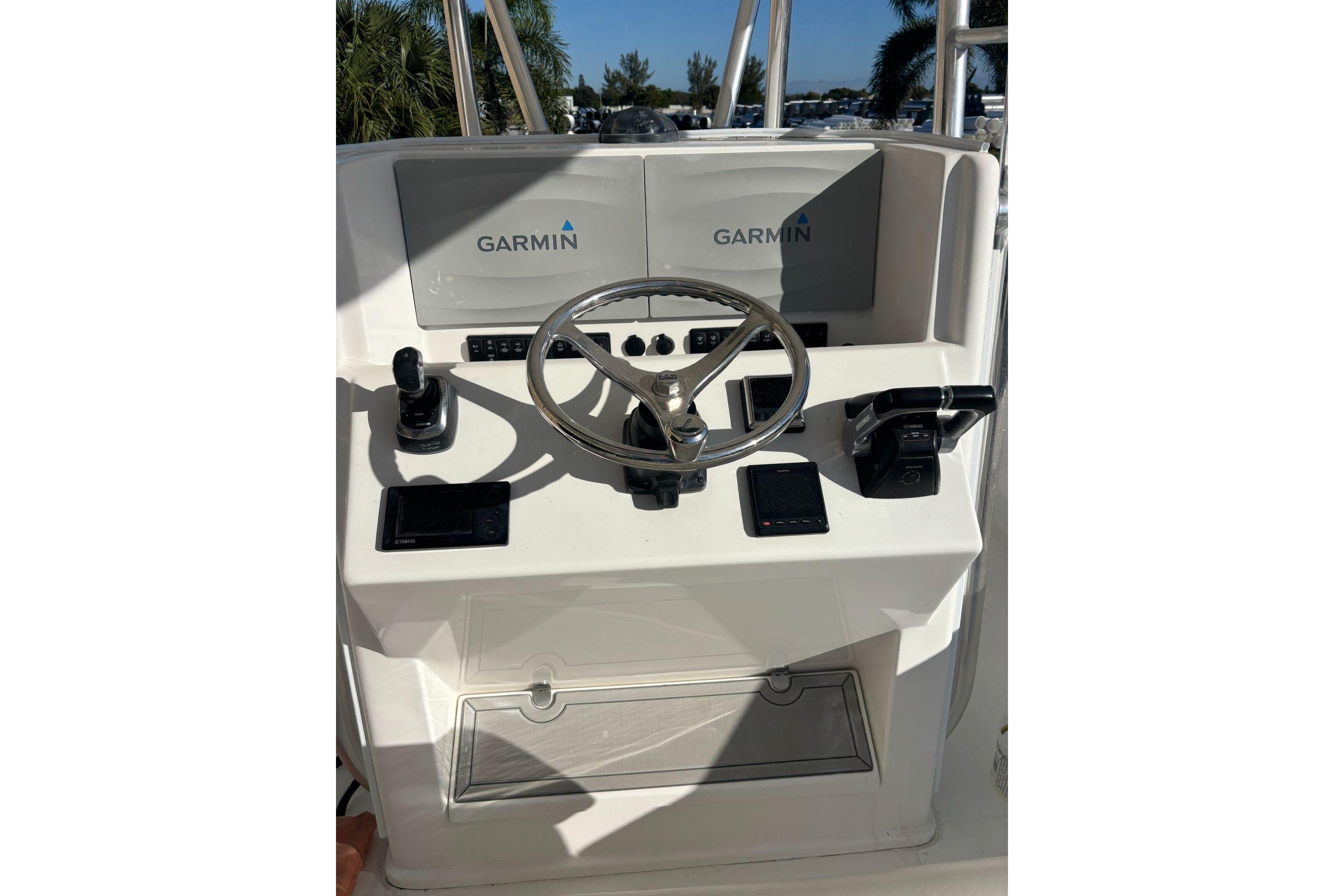 Steering console of 2017 Venture 39 Open boat with Garmin navigation system.