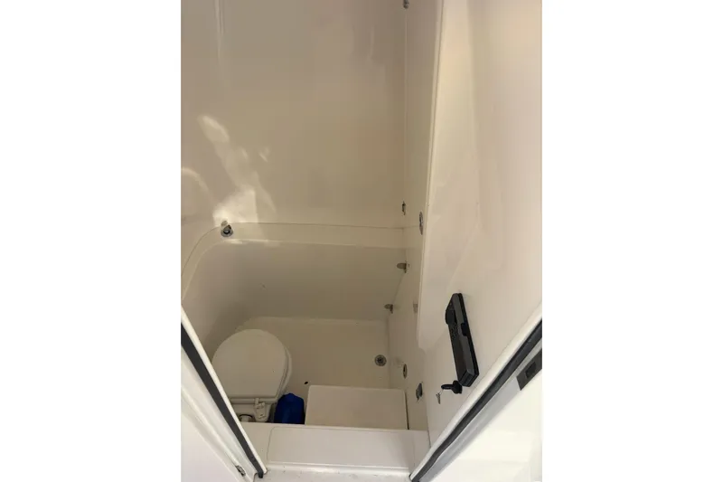  Yacht Photos Pics 2017 Venture 39 Open boat interior bathroom with toilet and compact design.