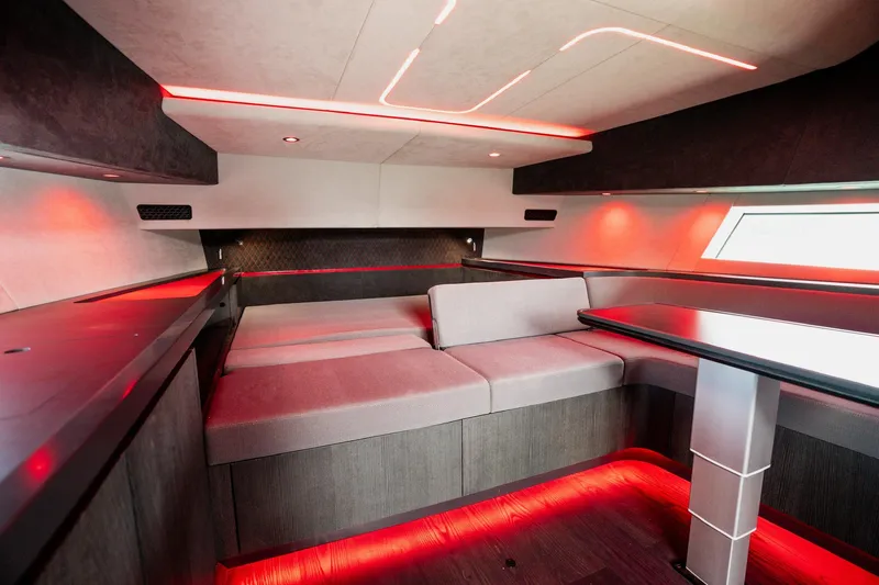 Mana Yacht Photos Pics Luxurious interior of 2025 Maori 54XL yacht with modern red LED lighting.