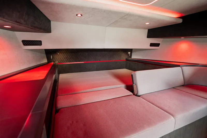 Mana Yacht Photos Pics Luxurious interior of 2025 Maori 54XL yacht with modern seating and ambient lighting.