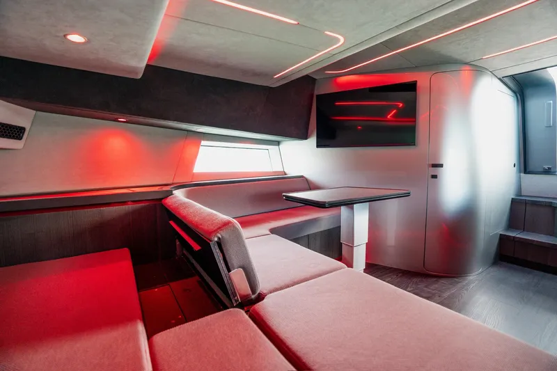 Mana Yacht Photos Pics Luxurious interior of 2025 Maori 54XL yacht with modern seating and ambient lighting.