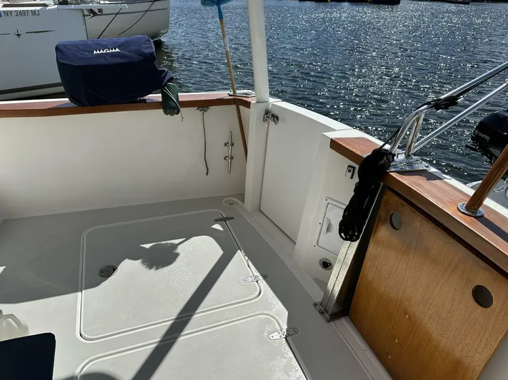 Blue Goose Yacht Photos Pics 2003 Sabre 36 Fly Bridge Sedan boat deck with water view.