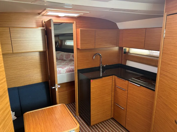  Yacht Photos Pics 2017 Bavaria S36 Coupe interior with modern kitchen and cozy cabin.