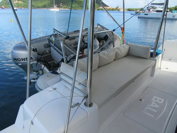 Lady Ana Yacht Photos Pics Luxury Bali 4.1 yacht with Honda motor, featuring comfortable seating and scenic water view.