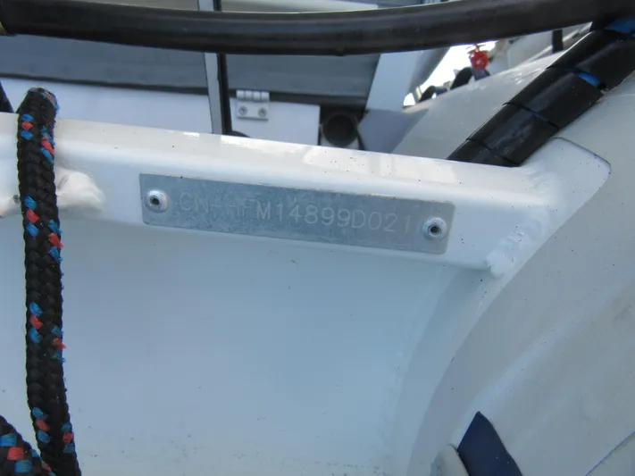 Lady Ana Yacht Photos Pics Hull identification number on a 2020 Bali 4.1 boat, featuring a metal plate.