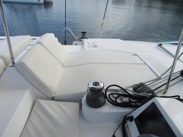 Lady Ana Yacht Photos Pics Luxurious Bali 4.1 catamaran deck with comfortable seating, winch, and navigation equipment, 2020 model.