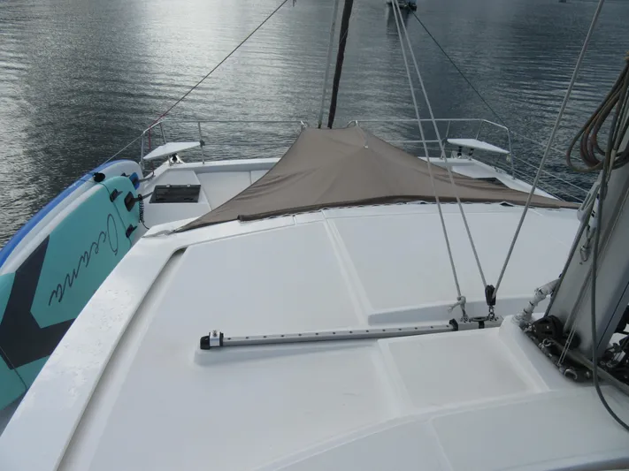 Lady Ana Yacht Photos Pics Deck view of a 2020 Bali 4.1 catamaran with paddleboard and canopy.