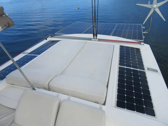 Lady Ana Yacht Photos Pics Catamaran Bali 4.1 (2020) with solar panels and wind turbine on deck.