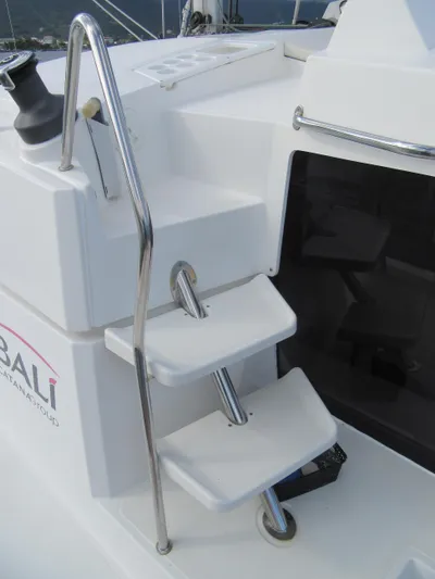 Lady Ana Yacht Photos Pics Stainless steel and white steps on a 2020 Bali 4.1 catamaran deck.
