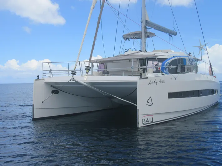 Lady Ana Yacht Photos Pics 2020 Bali 4.1 catamaran sailing on calm ocean under clear blue sky.