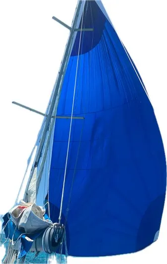 Monica Yacht Photos Pics 2006 Alubat Ovni 395 Centerboard sailboat with vibrant blue sails.