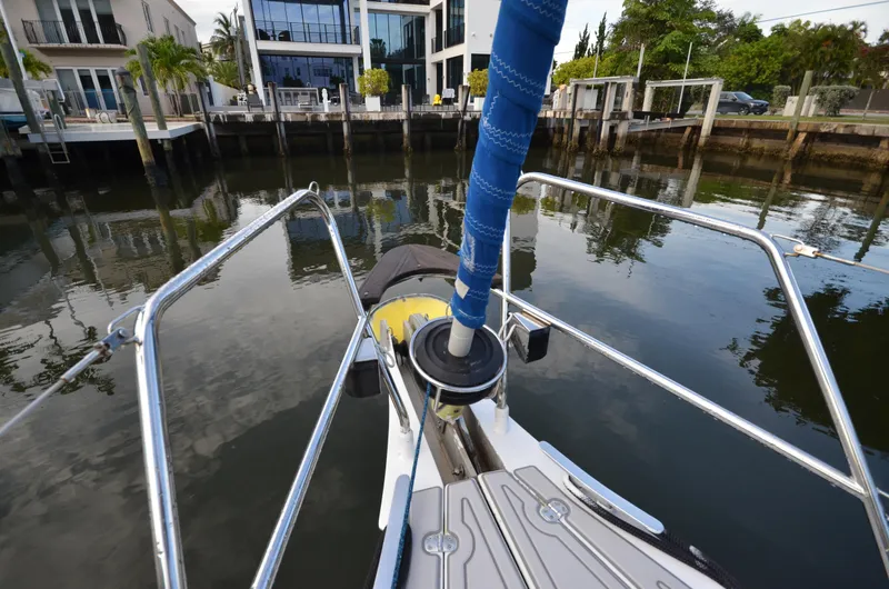 Monica Yacht Photos Pics Bow view of 2006 Alubat Ovni 395 Centerboard yacht docked near waterfront homes.