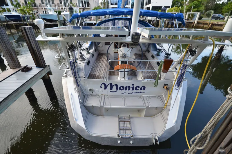 Monica Yacht Photos Pics 2006 Alubat Ovni 395 Centerboard yacht docked at marina, rear view.