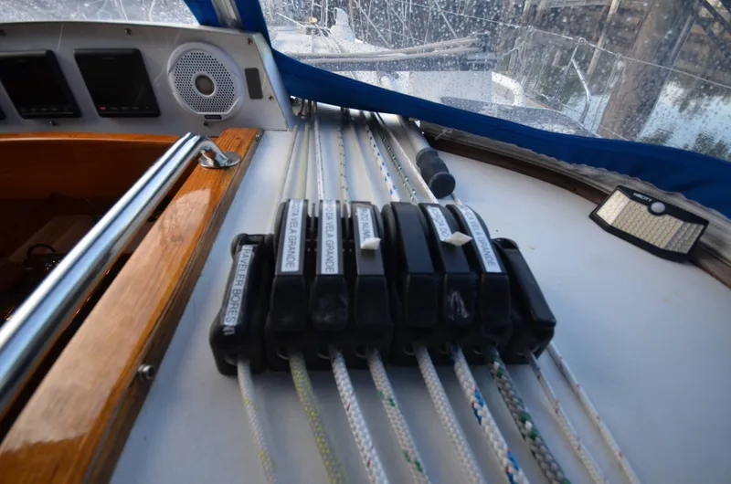Monica Yacht Photos Pics Control panel and ropes on 2006 Alubat Ovni 395 Centerboard sailboat deck.