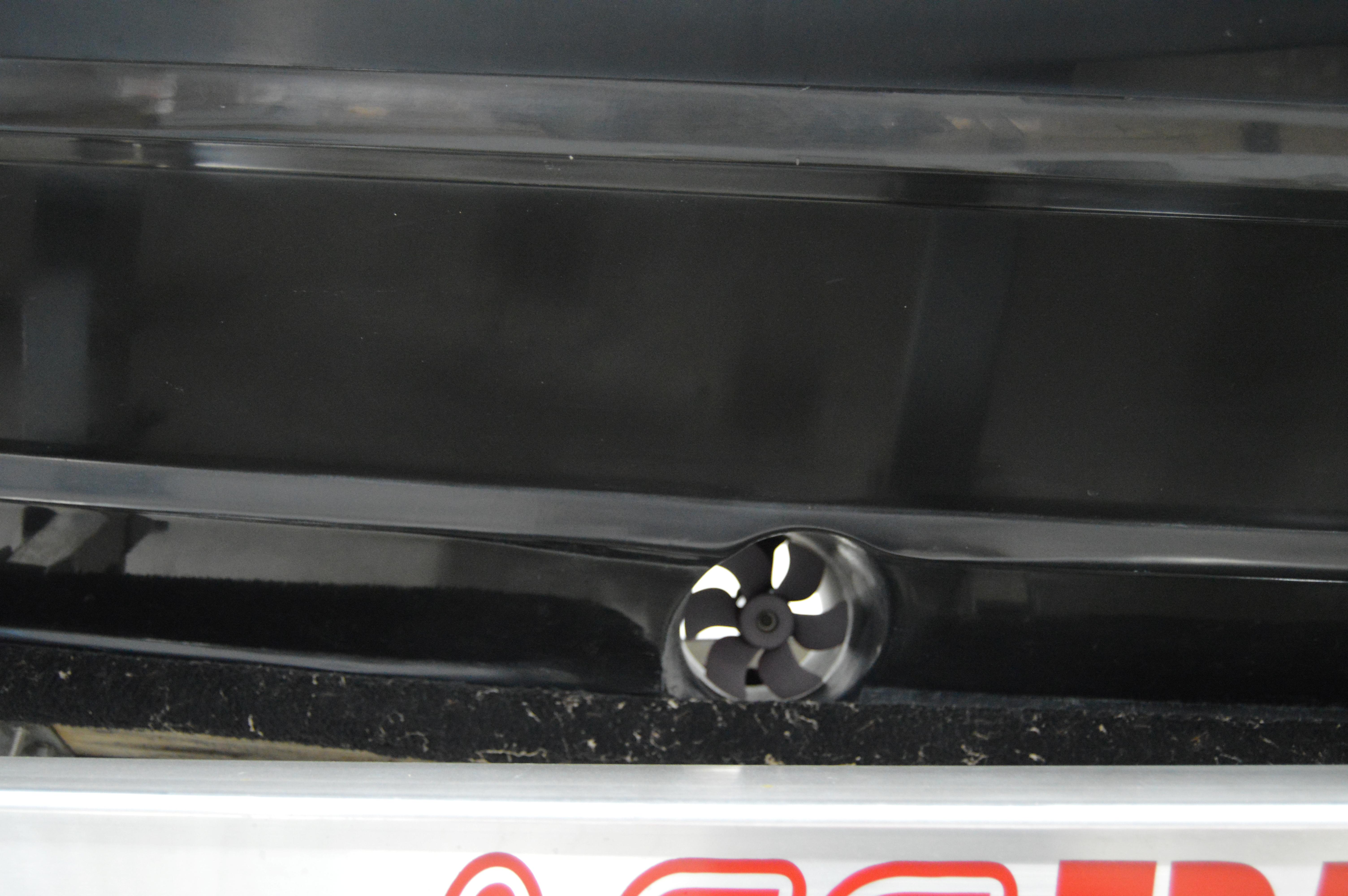 2017 Statement 380 Open boat detail with visible propeller component.