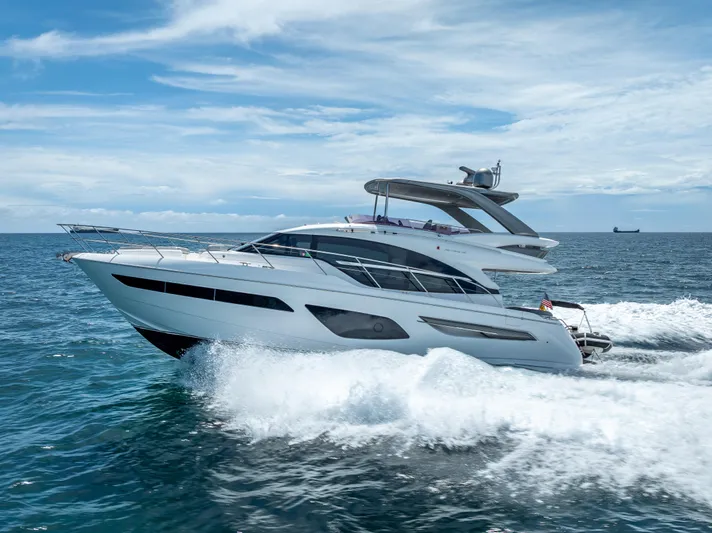  Yacht Photos Pics 2018 Princess F55 yacht cruising on open sea under clear skies.