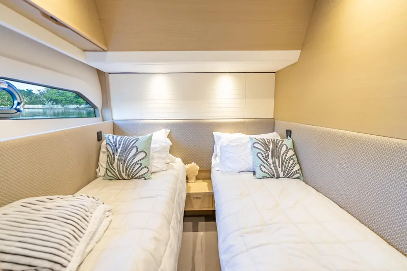  Yacht Photos Pics Luxurious twin cabin interior on a 2018 Princess F55 yacht.