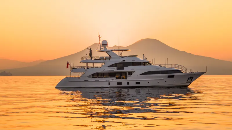Safad Yacht Photos Pics Benetti 121 yacht 2015 at sunset with mountain backdrop.