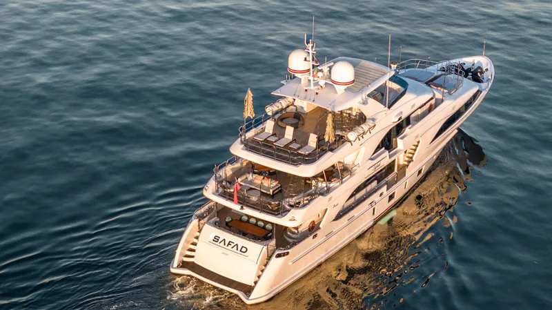 Safad Yacht Photos Pics Aerial view of 2015 Benetti 121 luxury yacht cruising on calm waters.