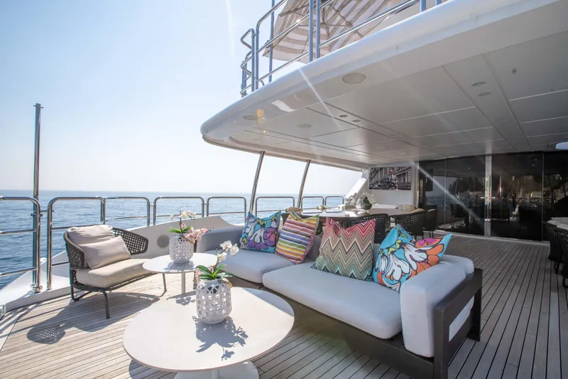 Safad Yacht Photos Pics Luxurious 2015 Benetti 121 yacht deck with stylish seating and ocean view.