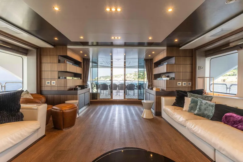 Safad Yacht Photos Pics Luxurious interior of 2015 Benetti 121 yacht with modern furnishings and ocean view.