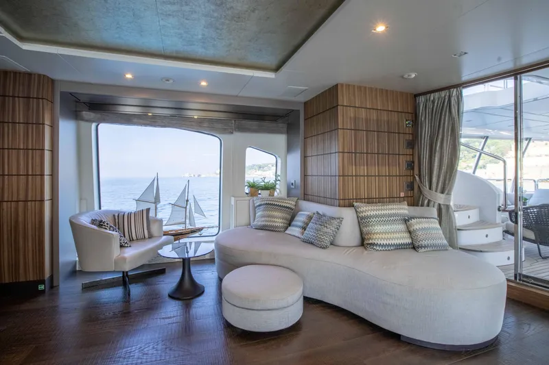 Safad Yacht Photos Pics Luxurious interior of 2015 Benetti 121 yacht with modern furnishings and ocean view.