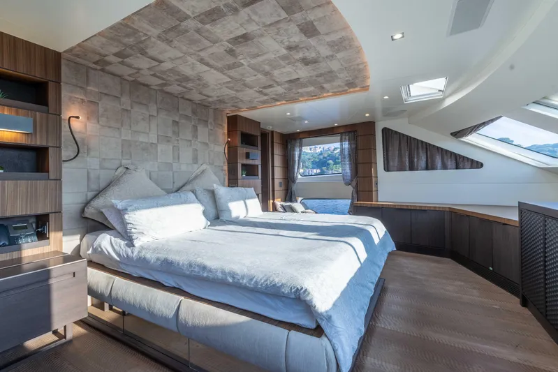 Safad Yacht Photos Pics Luxurious bedroom interior of 2015 Benetti 121 yacht with modern design and large windows.