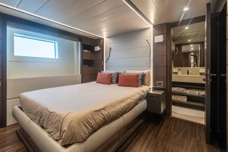Safad Yacht Photos Pics Luxurious bedroom interior of 2015 Benetti 121 yacht with modern design and cozy lighting.