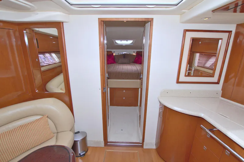  Yacht Photos Pics Interior of 2009 Sea Ray 44 Sundancer yacht with modern furnishings and cozy cabin.