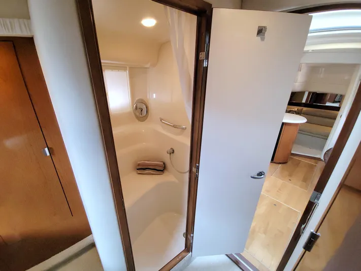  Yacht Photos Pics Shower area inside 2009 Sea Ray 44 Sundancer yacht, featuring sleek design and modern amenities.