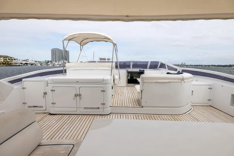  Yacht Photos Pics Luxurious 1999 Azimut 100 Jumbo yacht deck with seating and ocean view.