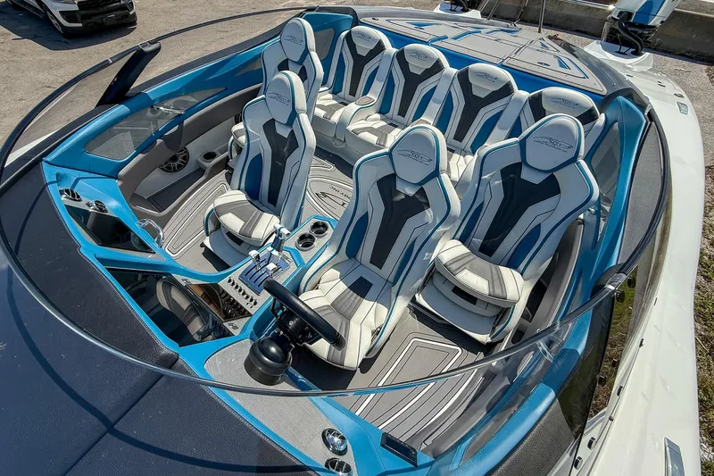 El Gato Yacht Photos Pics Luxury MTI 390X 2022 boat interior with sleek blue and white seating arrangement.