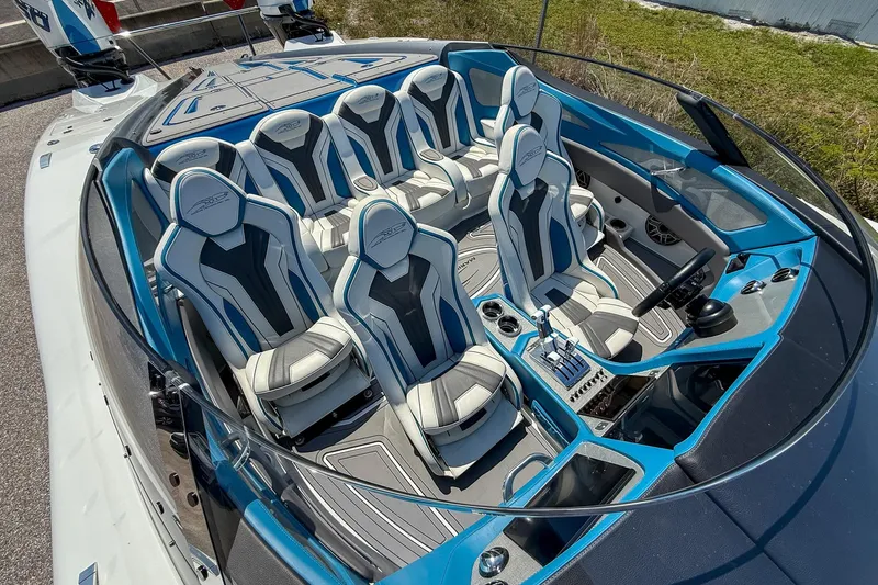 El Gato Yacht Photos Pics Luxury MTI 390X 2022 boat interior with blue and white seating, sleek design.