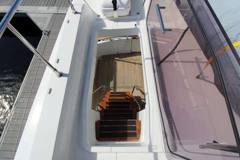 Next Chapter Yacht Photos Pics View of the staircase on a 2014 Beneteau Swift Trawler 44 yacht.