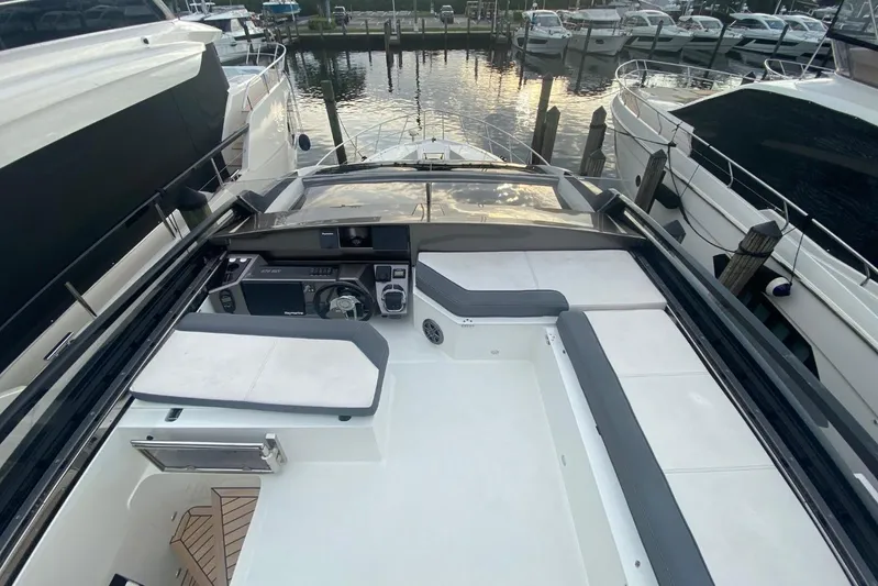  Yacht Photos Pics 2019 Galeon 470 Sky yacht cockpit with sleek design and modern controls at marina.