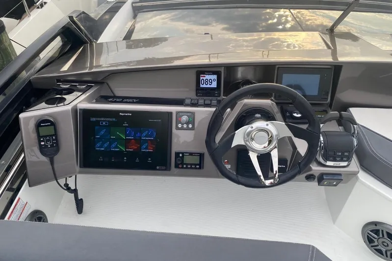  Yacht Photos Pics Cockpit of 2019 Galeon 470 Sky yacht with modern navigation controls and steering wheel.