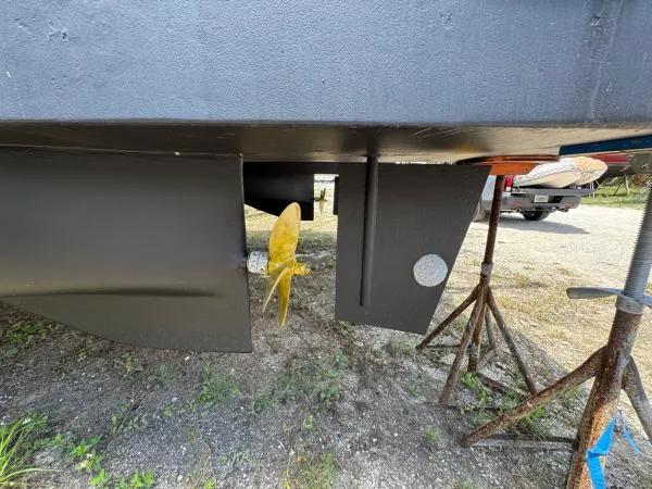 Bobcat Yacht Photos Pics Propeller and rudder of 2010 Cruiser Cats Havana 38 catamaran on dry dock.