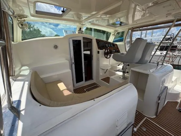 Bobcat Yacht Photos Pics Interior view of 2010 Cruiser Cats Havana 38 yacht with seating and helm station.