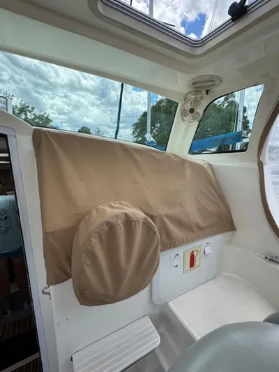 Bobcat Yacht Photos Pics Interior view of 2010 Cruiser Cats Havana 38 with covered control panel.