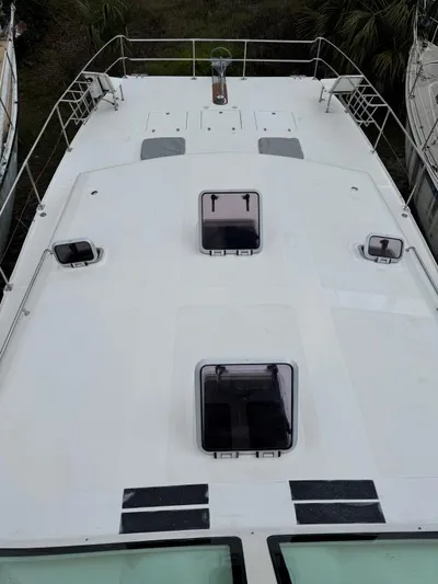 Bobcat Yacht Photos Pics Cruiser Cats Havana 38 catamaran deck, 2010 model, featuring multiple hatches and railing.