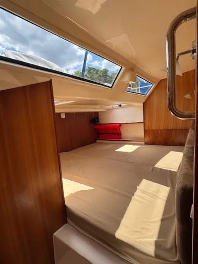 Bobcat Yacht Photos Pics Interior cabin of 2010 Cruiser Cats Havana 38 with skylights and wooden finish.