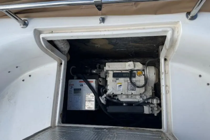 Bobcat Yacht Photos Pics Engine compartment of 2010 Cruiser Cats Havana 38 catamaran, featuring visible engine components.