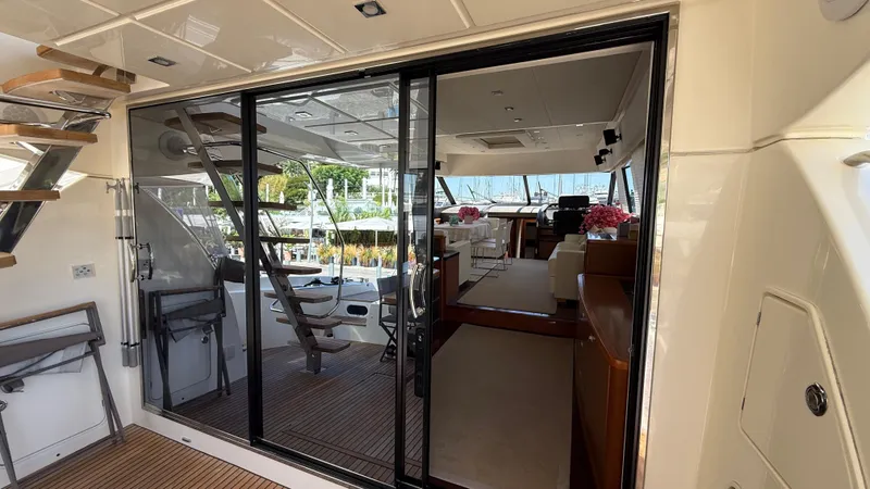  Yacht Photos Pics Luxurious interior of a 2013 Prestige 620 yacht with elegant seating and decor.