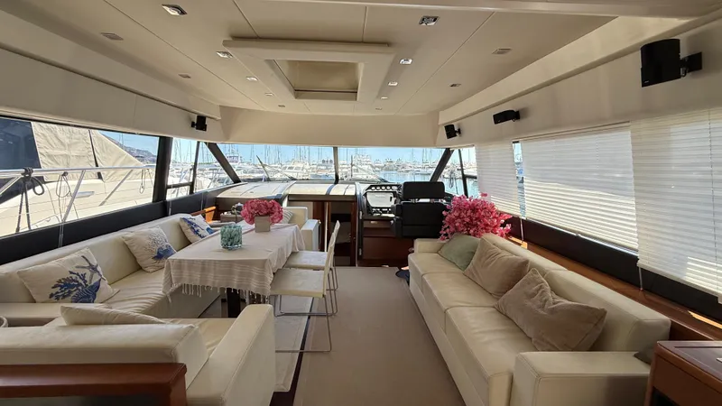  Yacht Photos Pics Luxurious interior of a 2013 Prestige 620 yacht with elegant seating and decor.