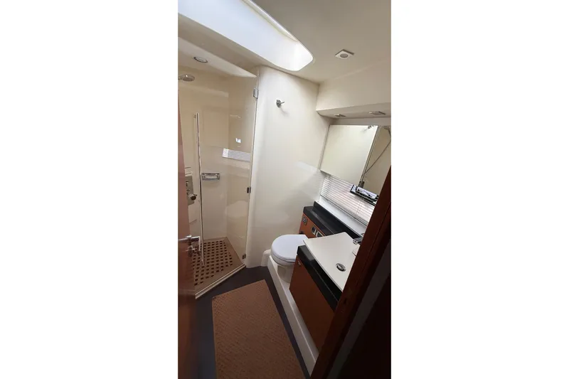  Yacht Photos Pics Luxurious bathroom in 2013 Prestige 620 yacht with modern fixtures and elegant design.