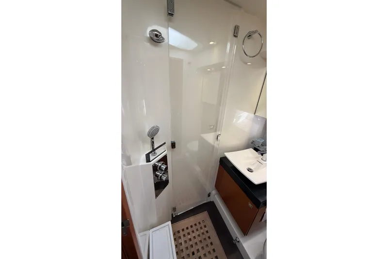  Yacht Photos Pics Luxurious bathroom interior of 2013 Prestige 620 yacht with modern fixtures.