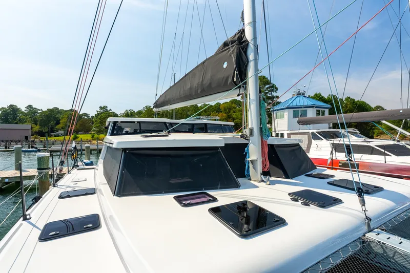 Carolina Red Yacht Photos Pics 2024 St Francis 460 catamaran docked at marina, showcasing sleek design and modern features.