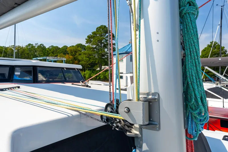 Carolina Red Yacht Photos Pics Sailboat rigging on a 2024 St Francis 460, featuring colorful ropes and mast details.