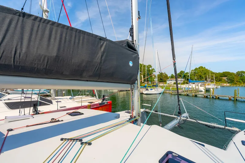 Carolina Red Yacht Photos Pics 2024 St Francis 460 sailboat docked at marina with clear blue sky.